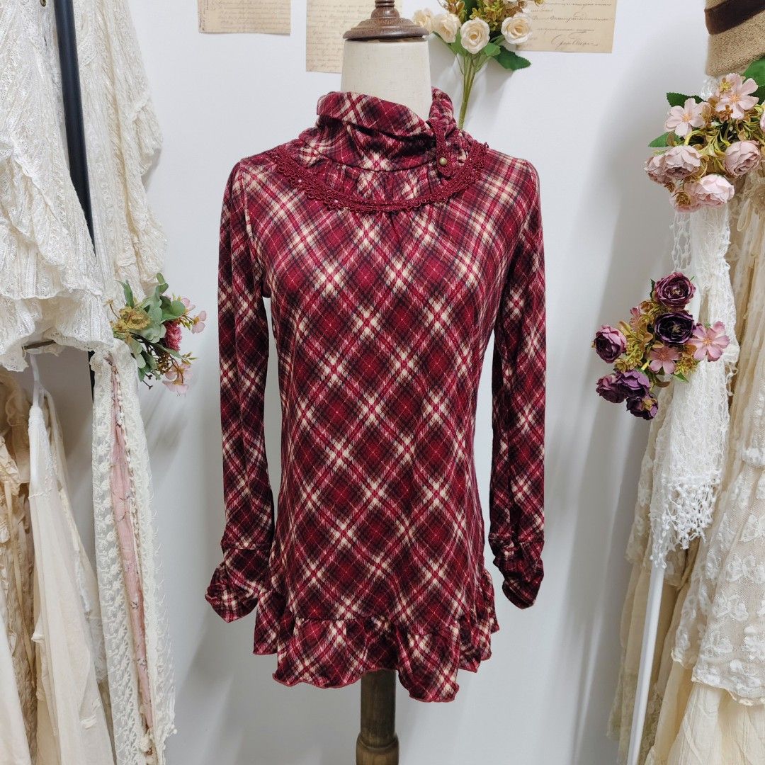 Lace top on a mannequin in a cluttered shop setting