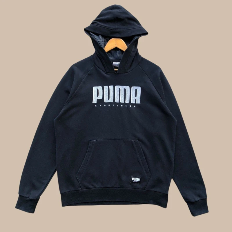 Flat lay PUMA hoodie photo before ghost mannequin effect